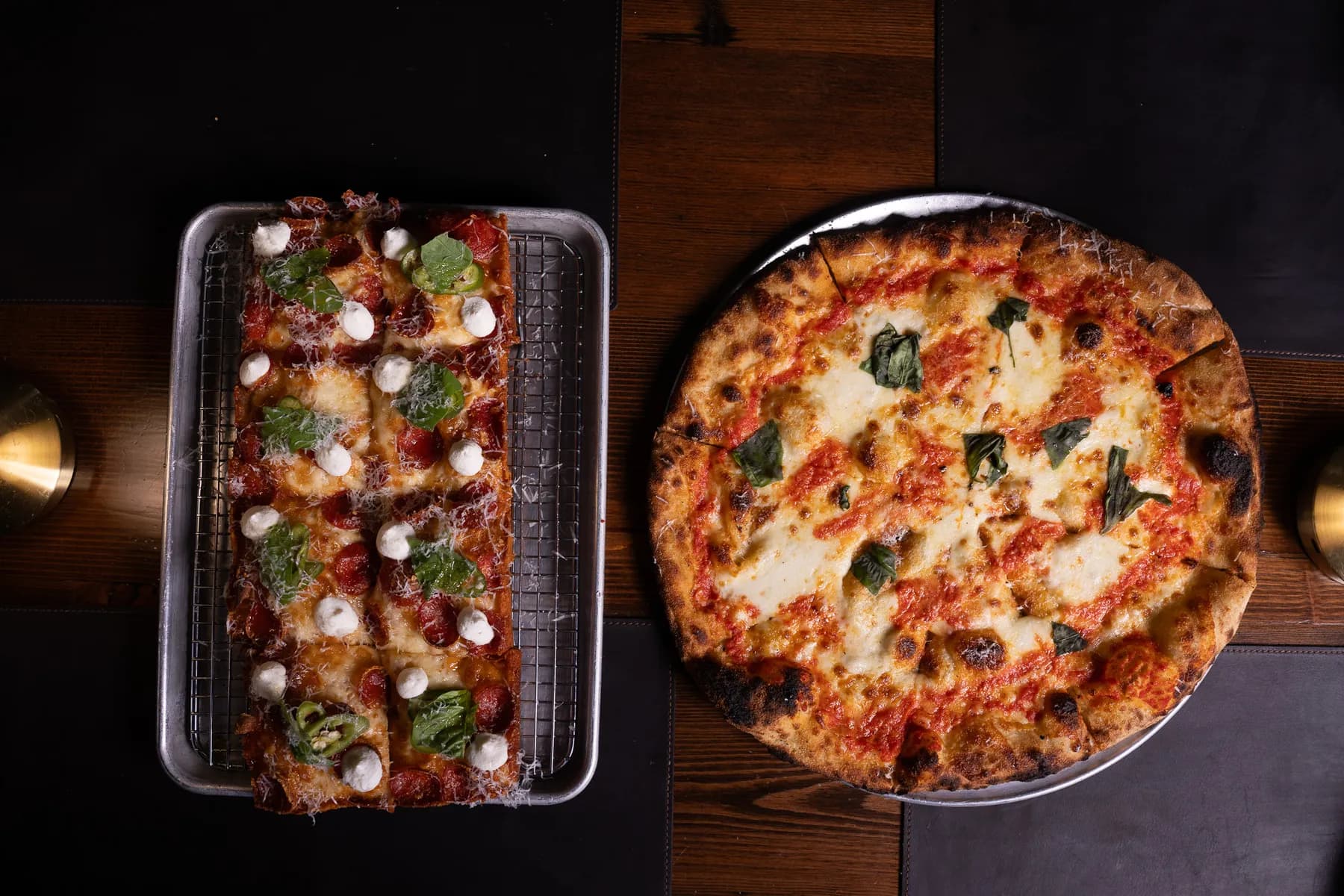 Round and Detroit-style square pizzas from Knead's brick-fire oven